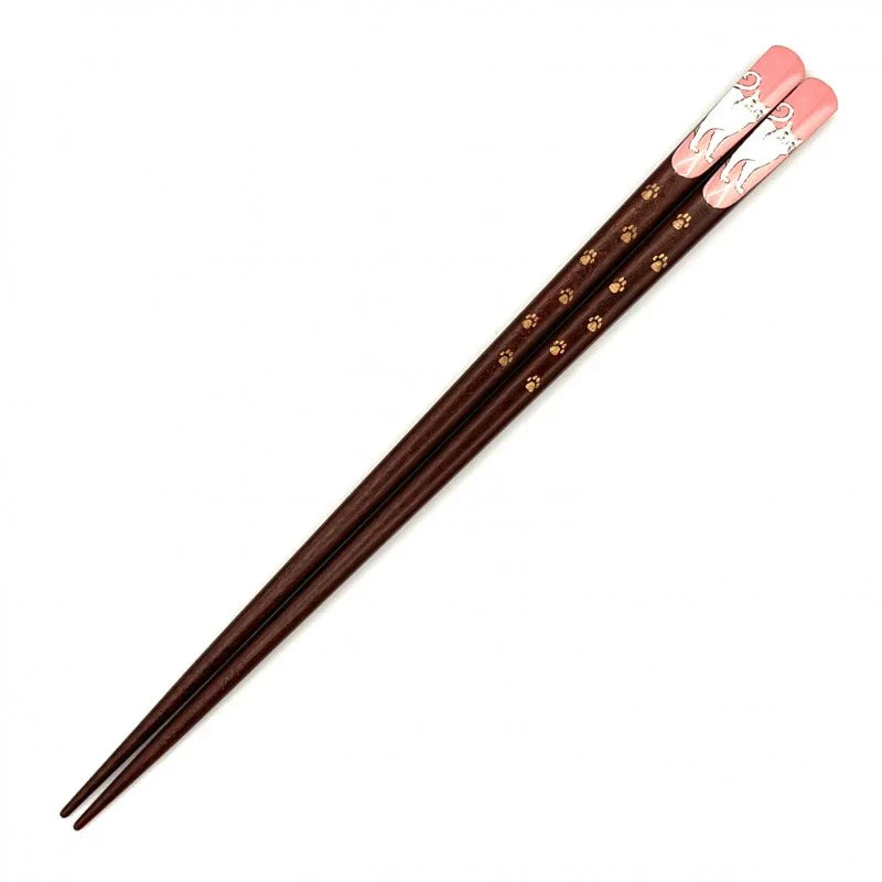 Chopsticks from Ginza Natsuno featuring a delicate design with pink and white accents and floral motifs on the tips.